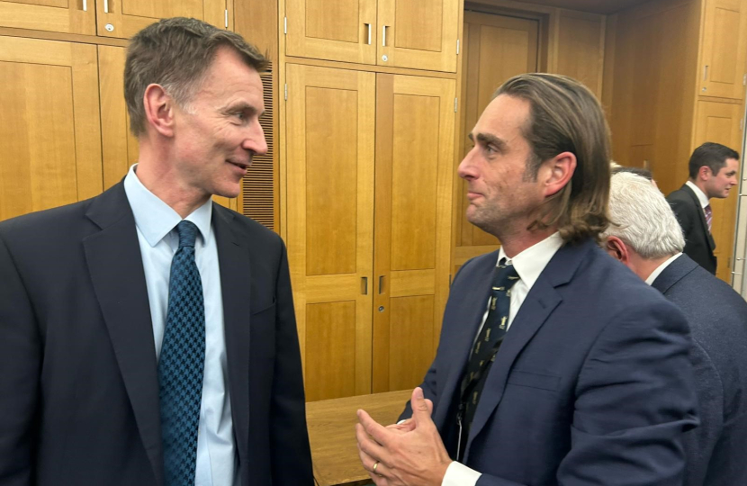 Alex Clarkson talking with Jeremy Hunt